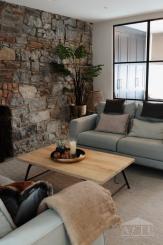 Living room with natural limestone feature wall