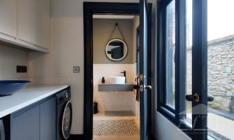 First-floor bathroom and laundry area at 59 William Street