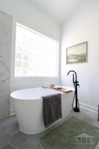 Free standing tub in the master bathroom