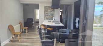 Kitchen, Dining through to Sitting Rooms